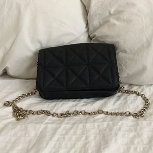 Black purse with gold strap!